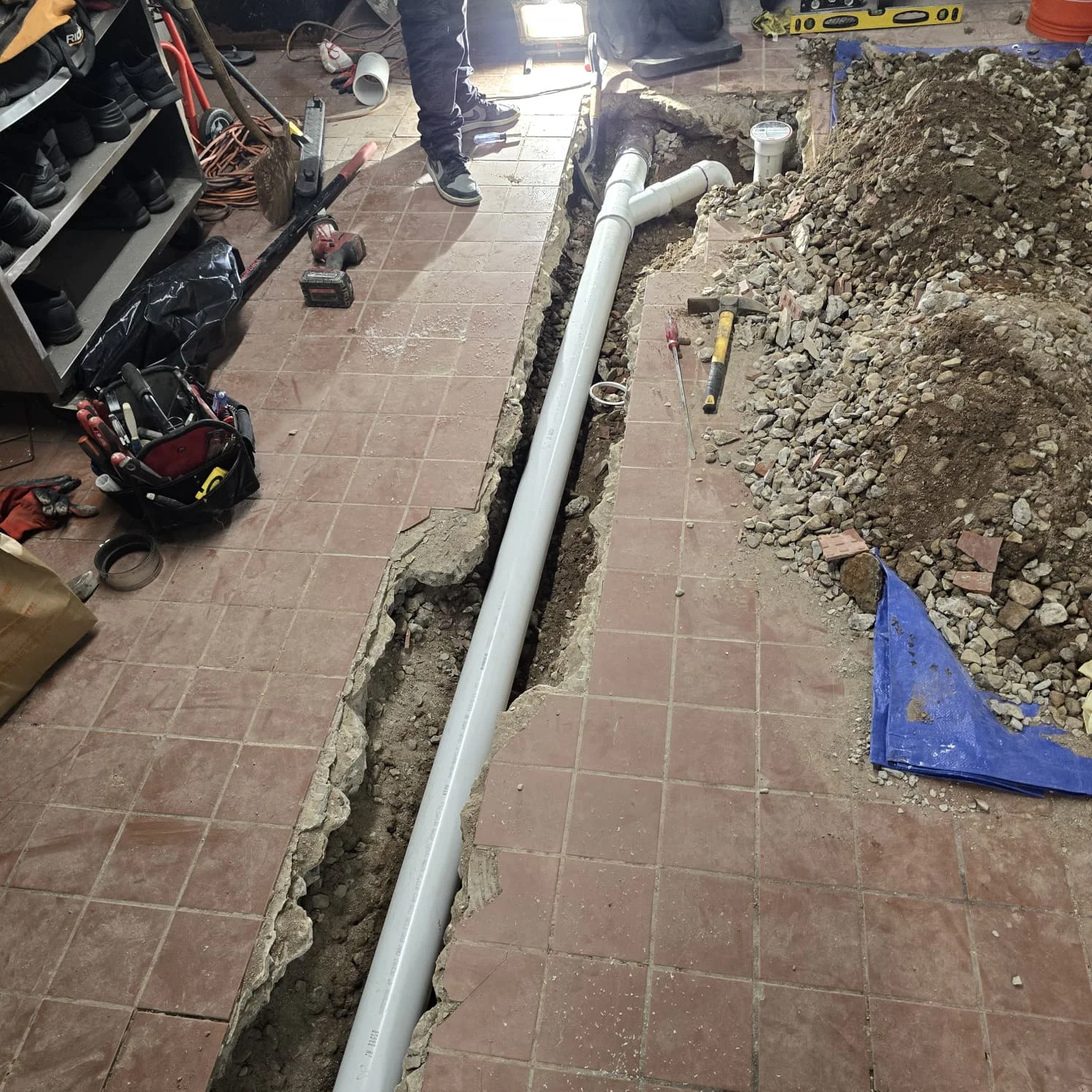 Sewer line repair beneath a concrete slab at a commercial property